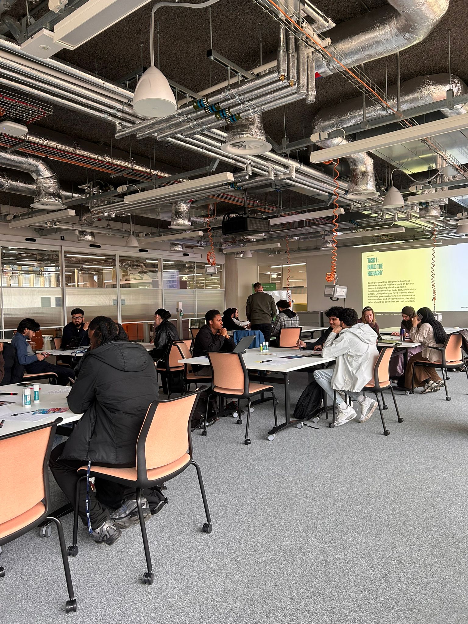 Students discussing user perception and design decisions