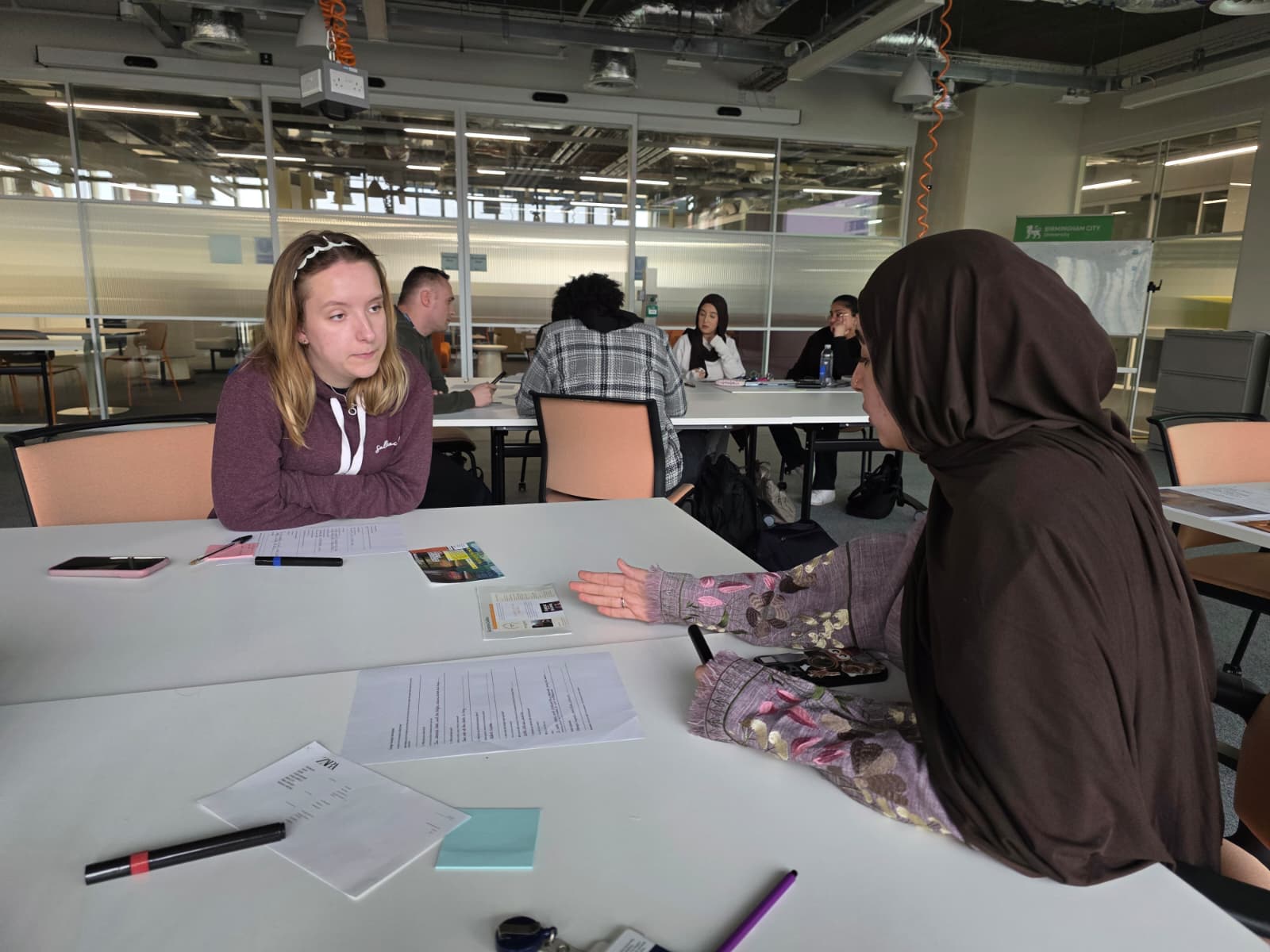 Students engaging in applied legal scenarios and decision making