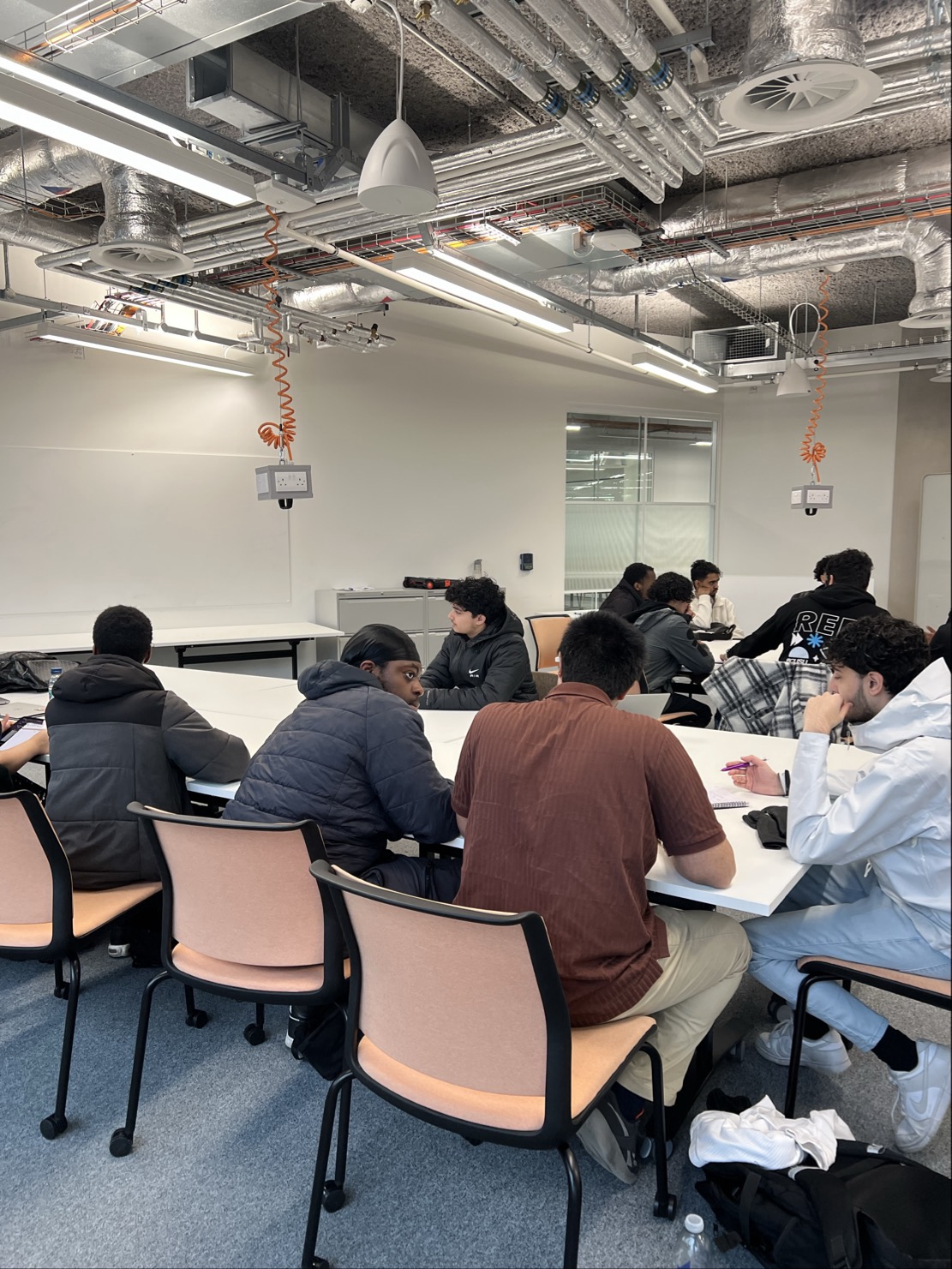 Participants learning startup fundamentals during Week 2